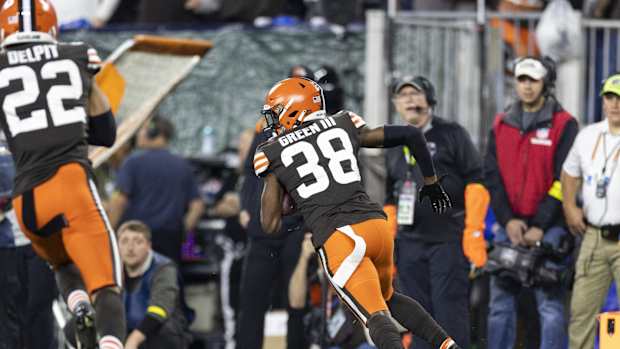 Oct 31, 2022; Cleveland, Ohio, USA; Cleveland Browns cornerback A.J. Green (38) runs the ball back following his interception against the Cincinnati Bengals during the first quarter at FirstEnergy Stadium. Mandatory Credit: Scott Galvin-USA TODAY Sports